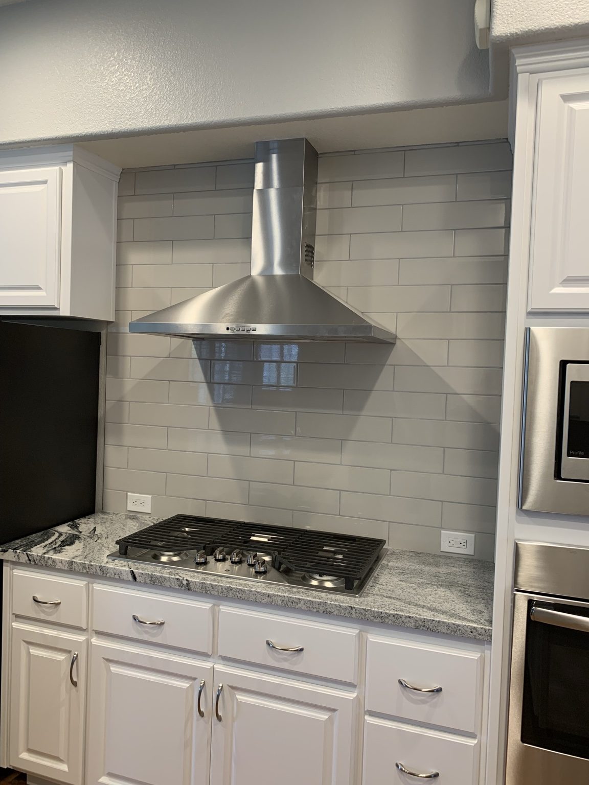 Kitchen hood & backsplash work